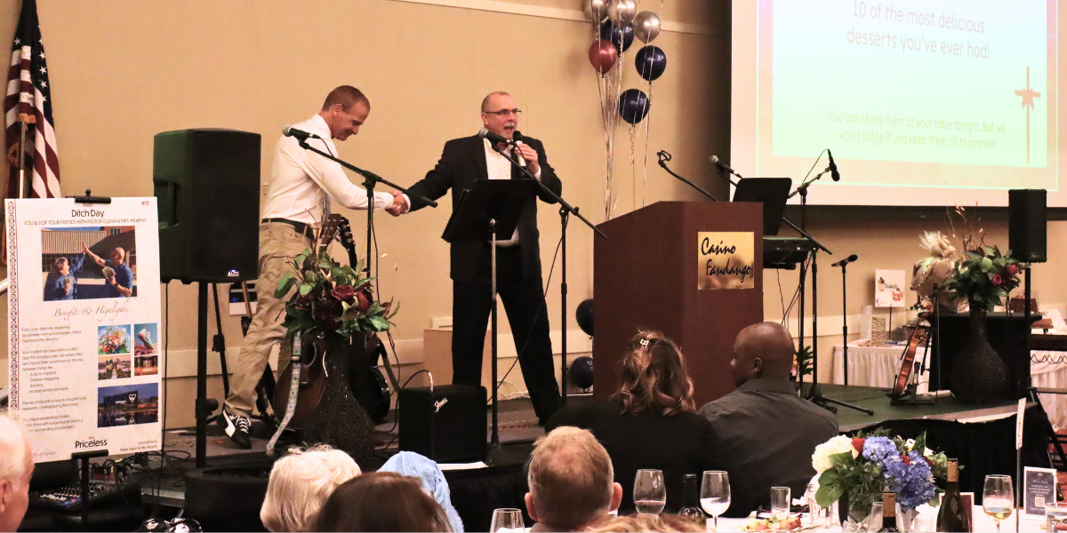 Mr. Underwood auctioneer at Sierra Lutheran's Gifts of Grace Dinner Auction